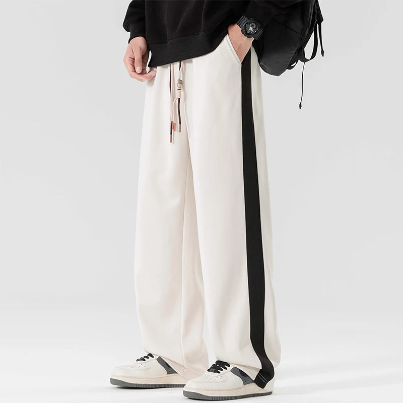 DRIFT STRIPED SWEATPANTS