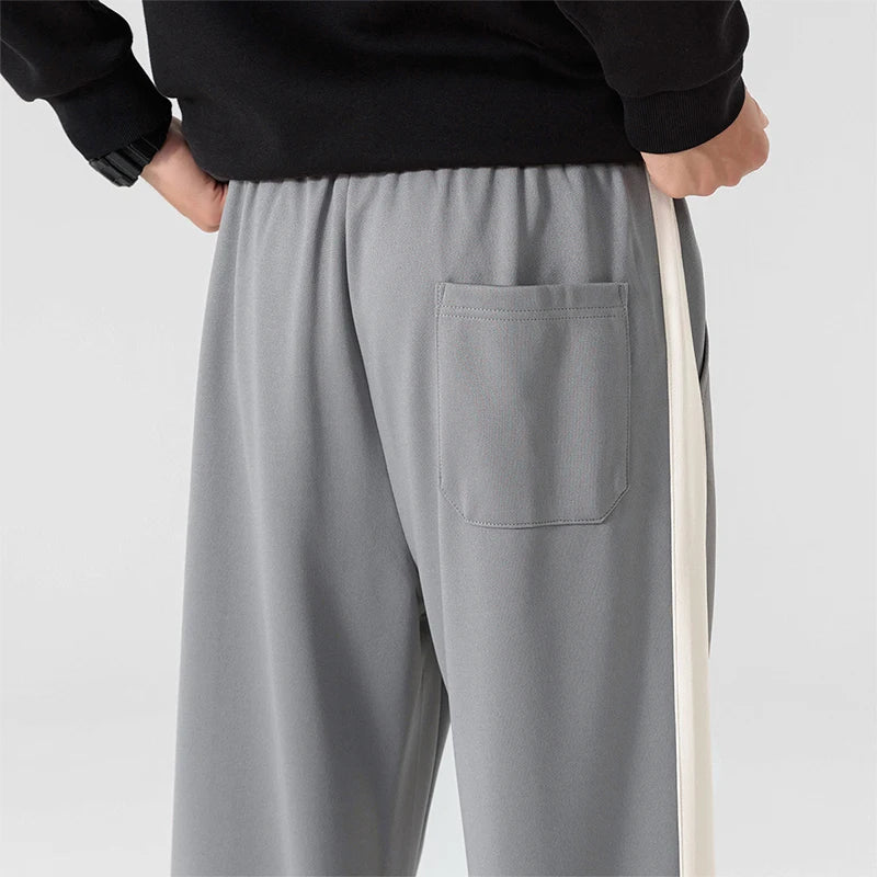 DRIFT STRIPED SWEATPANTS