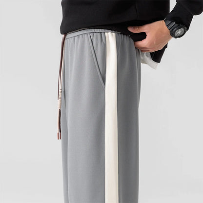 DRIFT STRIPED SWEATPANTS